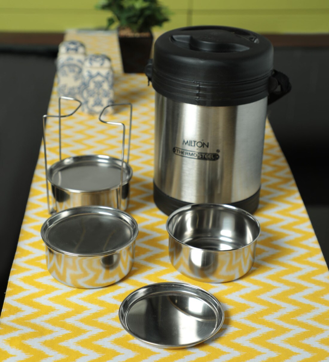 https://ii1.pepperfry.com/media/catalog/product/m/i/1100x1210/milton-insulated-tiffin-thermosteel-legend-4-steel-plain-milton-insulated-tiffin-thermosteel-legend--yytgyi.jpg