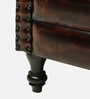 Miceli Leather Wing Chair With Pouffe In Brown Finish