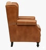 Miceli Leather Wing Chair With Pouffe In Tan Finish