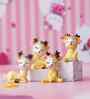 Miniature Cute Deer Set of 4 Yellow Polyresin Figurines