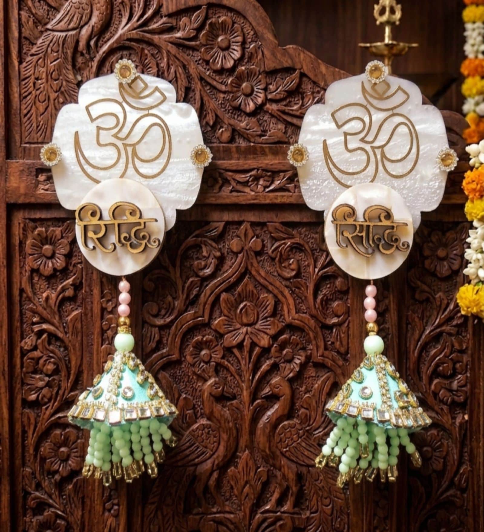 Mother Of Pearl Om Riddhi Siddhi Hangings With Green Latkans