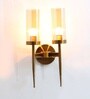 Modern Dual-Light Gold Wall Sconce with Amber Glass Cylindrical Shades