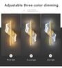 Modern Gold Wall Light with Elegant LED Ribbon Design