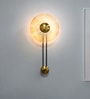 Modern Golden Pendulum-Style Steel And Round Amber Glass Decorative LED Wall Lamp