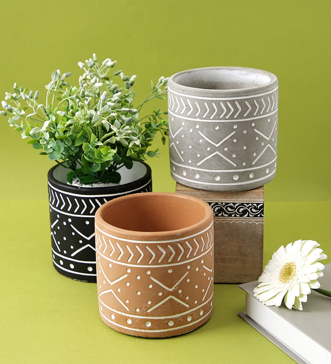 https://ii1.pepperfry.com/media/catalog/product/m/u/1100x1210/multicolour-ceramic--set-of-3--planter-by-tayhaa-multicolour-ceramic--set-of-3--planter-by-tayhaa-w2d77e.jpg