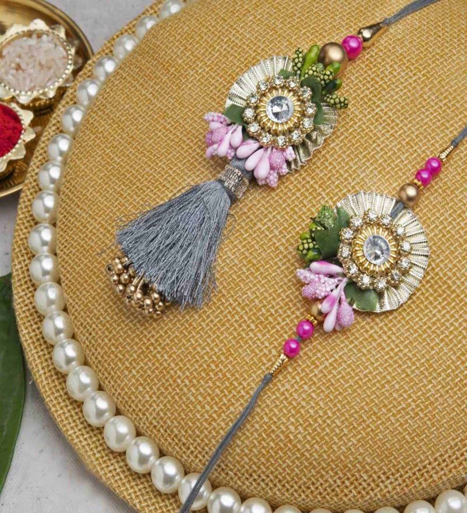 Buy Multicolor Floral Designer Bhaiya Bhabhi Rakhis Set with Roli ...