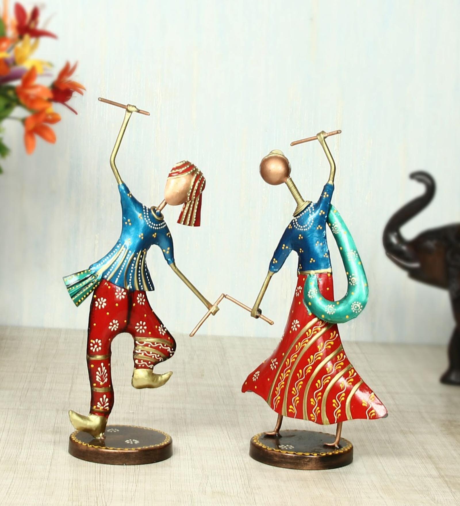 Multicolor Iron Couple Playing Dandia