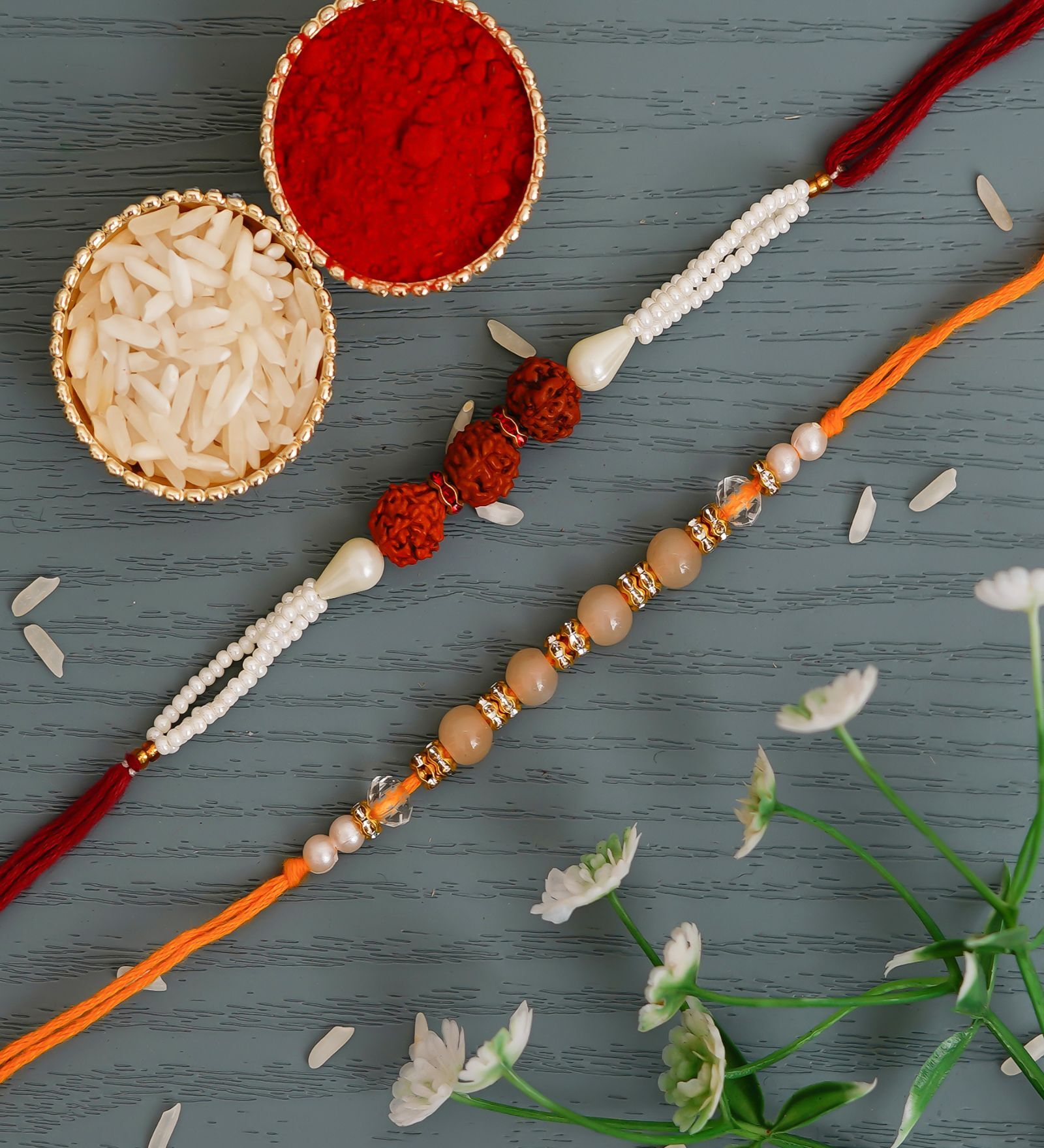 Buy Multicolor Set of 2 Rudraksha Pearls Designer Rakhis with Roli ...