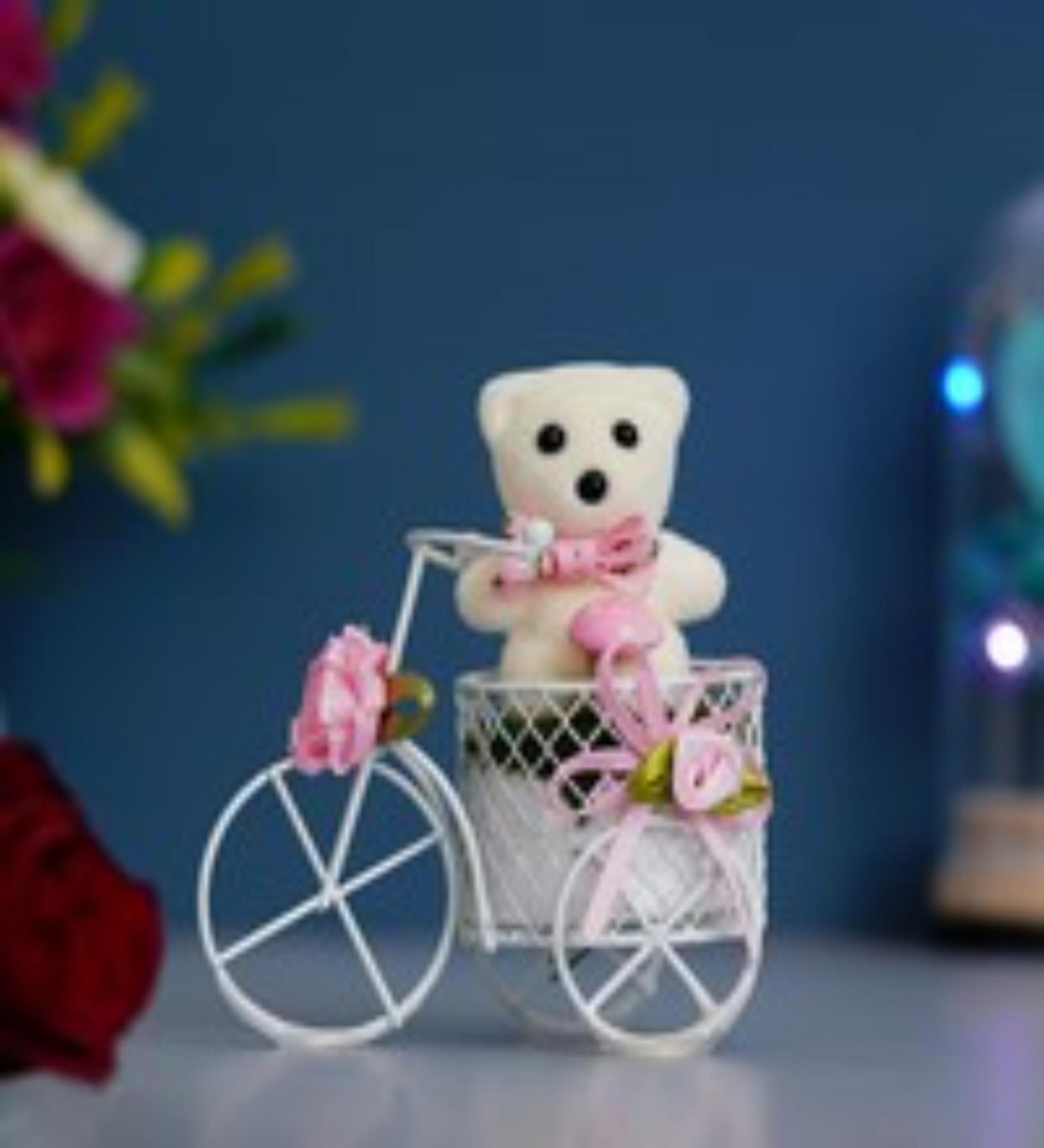 White Cycle With Teddy Bear And Rose Petals Showpiece
