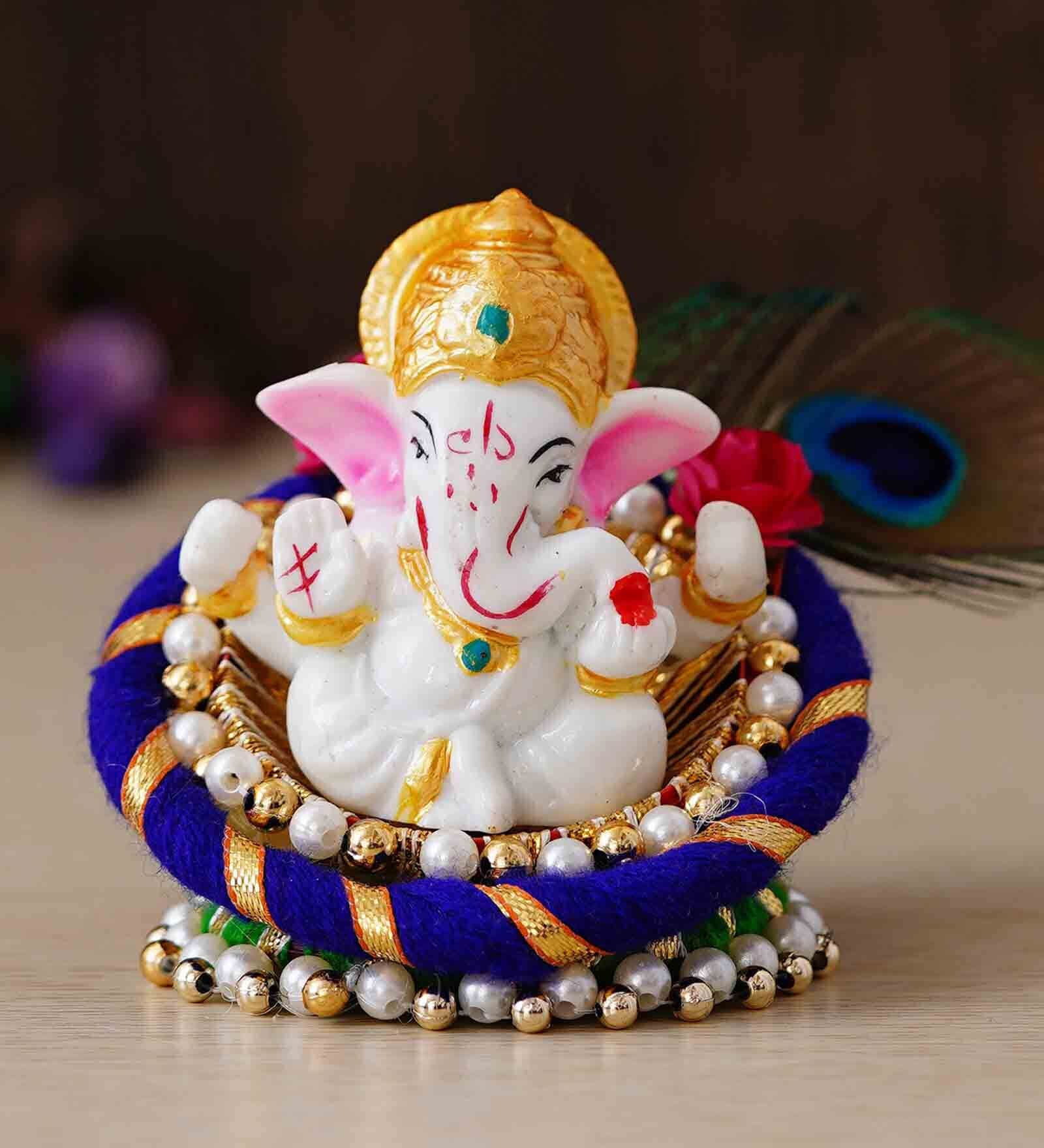 Multicolour Metal and Polyresin Lord Ganesha Idol on Decorative Handcrafted Floral Plate