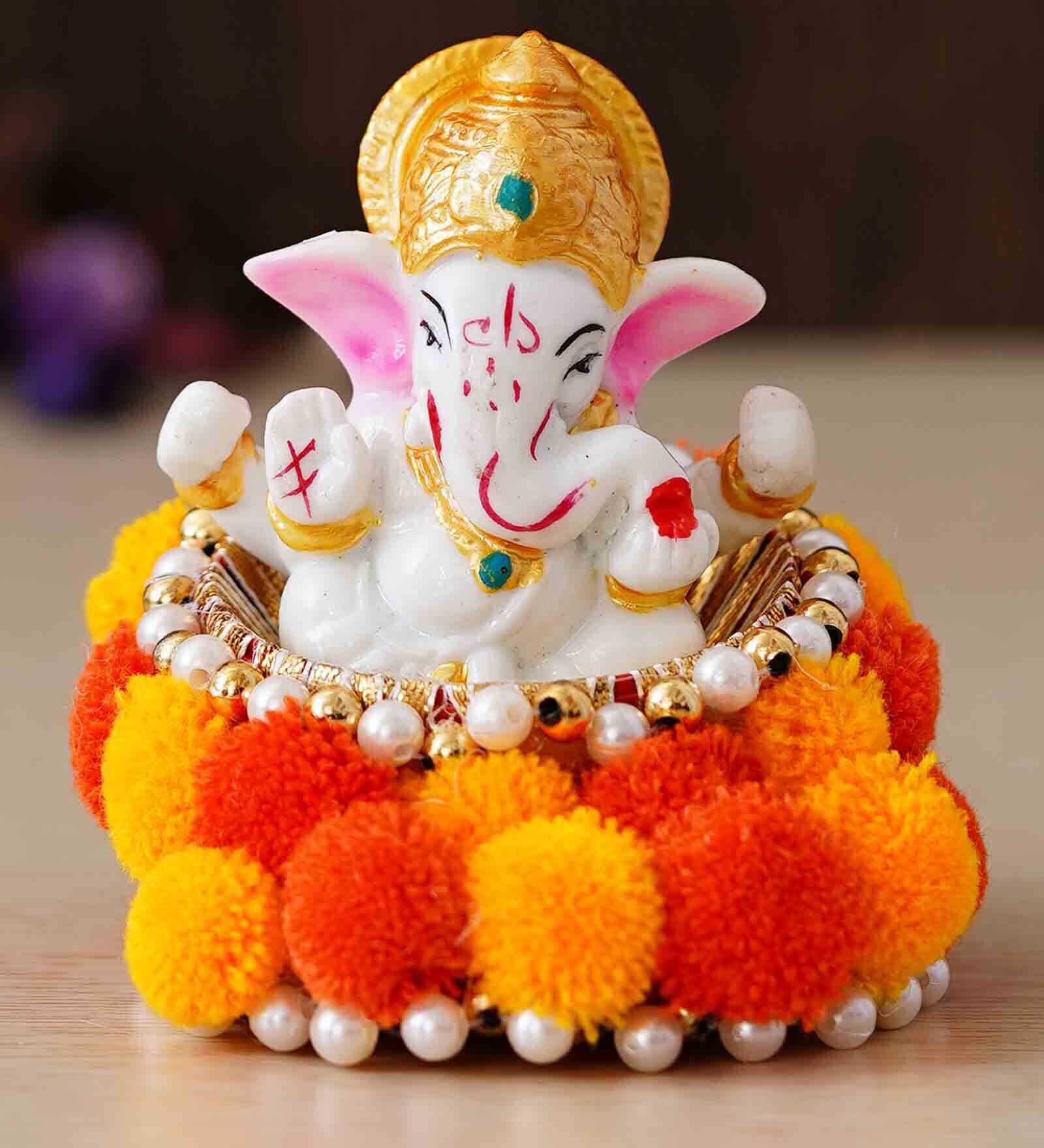 Multicolour Metal and Polyresin Lord Ganesha Idol on Decorative Handcrafted Floral Plate