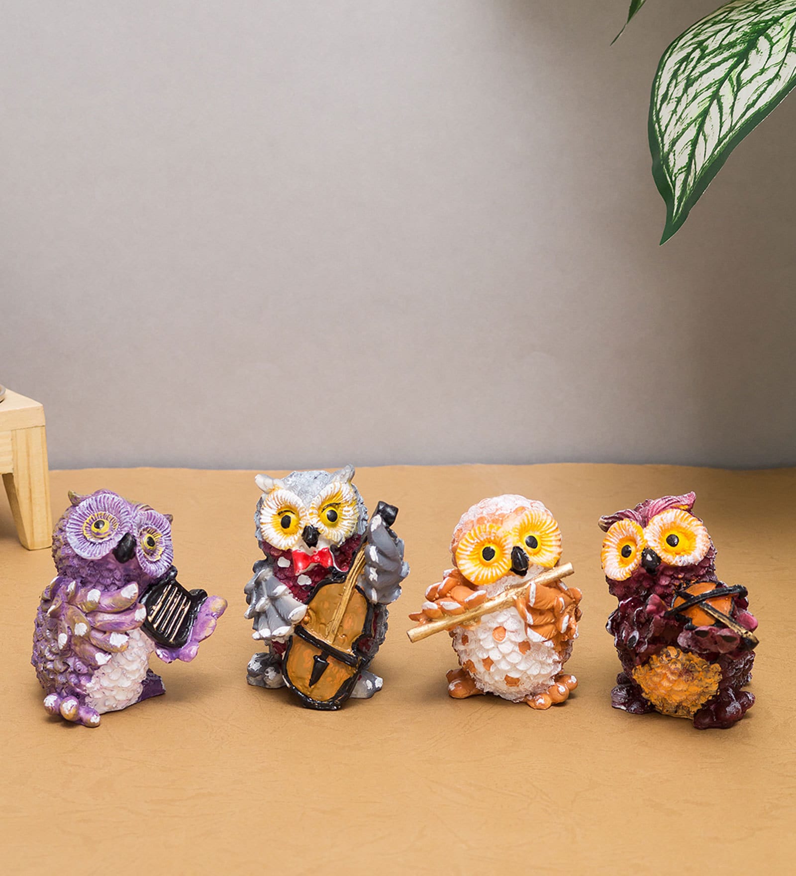 Buy Multicolour Polyresin Owl Playing Musical Instrument Figurine at 60