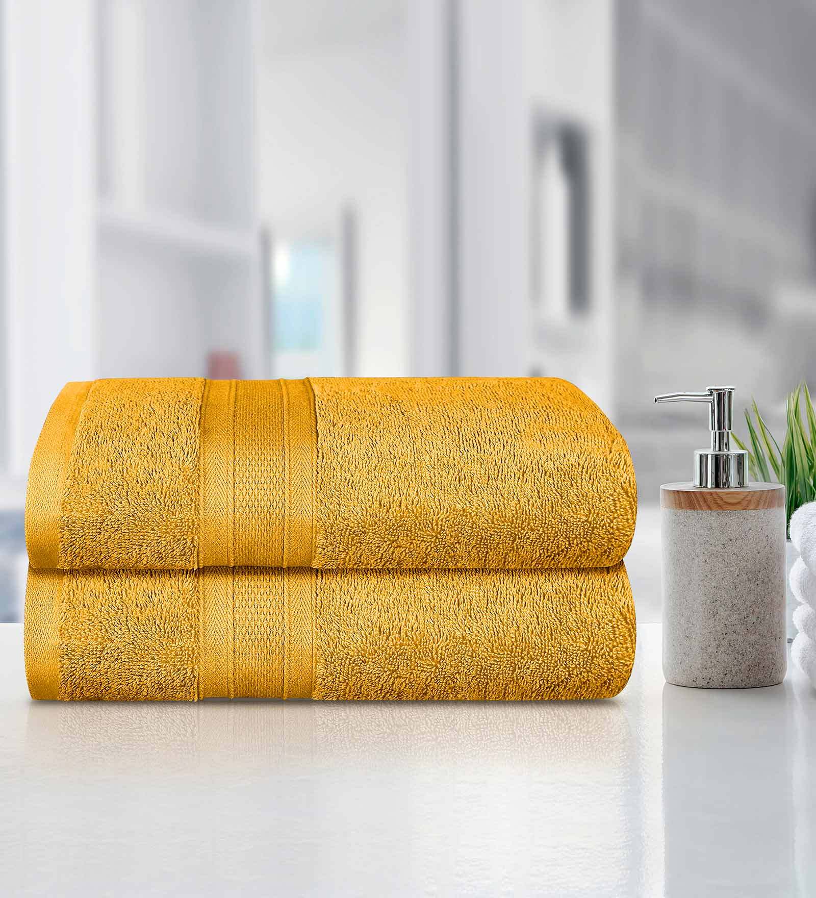 Buy Yellow Solid 500 GSM Cotton Bath Towels (Set of 2) by Trident at 40 OFF by Trident Pepperfry