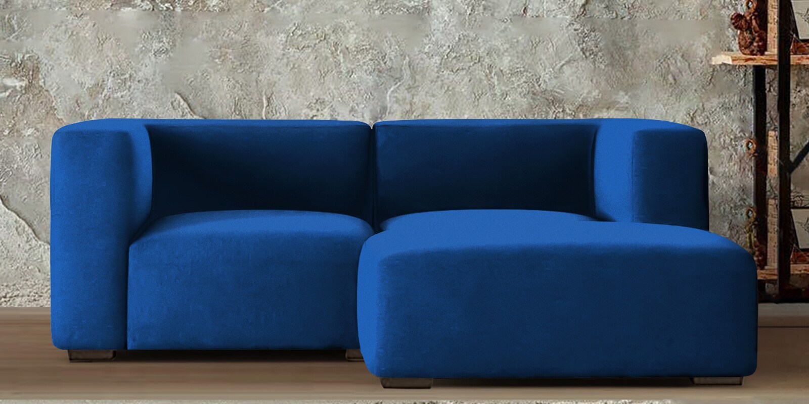 Muebles Velvet LHS Sectional Sofa With Lounger In Blue Colour