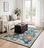 Blue Floral Wool And Cotton 5 X 8 Ft Hand Tufted Carpet