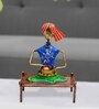Musician Sitting On Charpai Multicolour Metal Figurine