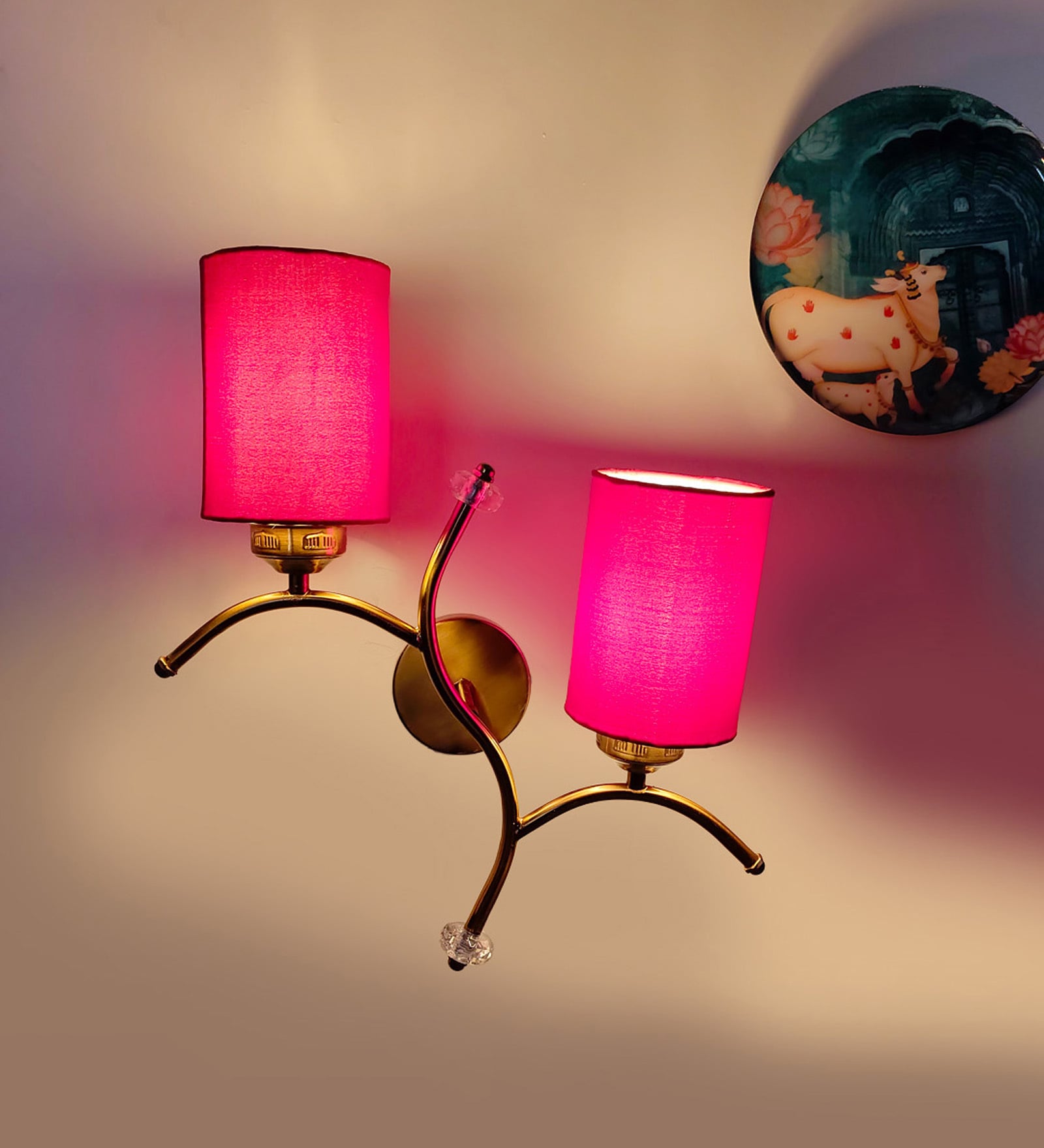 Dual wall mounted gold lamp with Red Cotton Shade