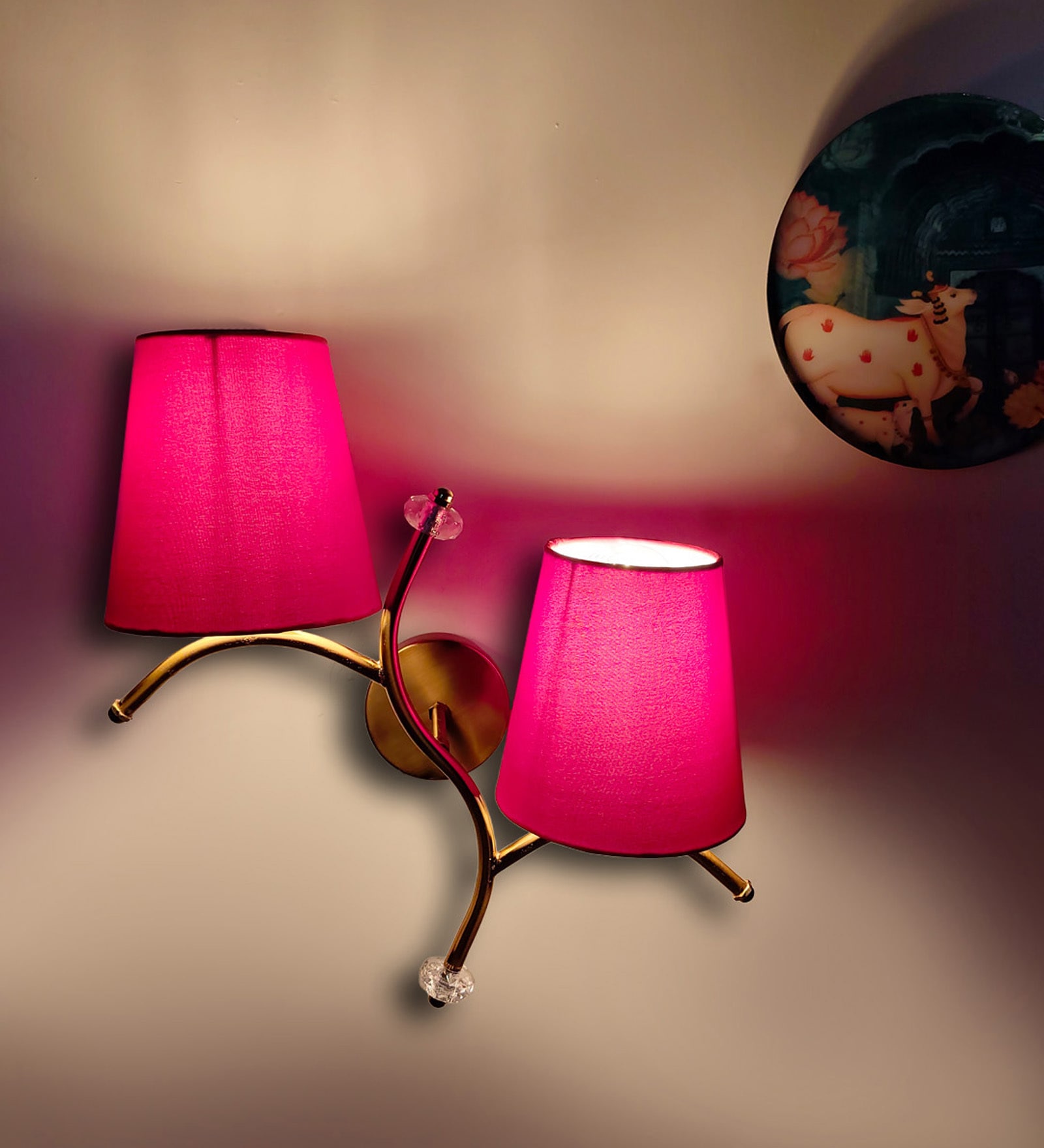 Dual wall mounted gold lamp with Red Cotton Shade