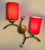 Dual wall mounted gold lamp with Red Cotton Shade