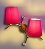 Dual wall mounted gold lamp with Red Cotton Shade