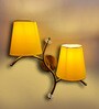 Dual wall mounted gold lamp with Yellow Cotton Shade