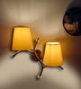 Dual wall mounted gold lamp with Yellow Cotton Shade
