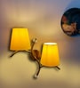 Dual wall mounted gold lamp with Yellow Cotton Shade