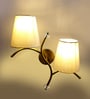 Dual wall mounted gold lamp with off-white Cotton Shade