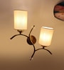 Dual wall mounted gold lamp with off-white Cotton Shade