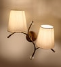 Dual wall mounted gold lamp with off-white Cotton Shade