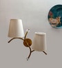 Dual wall mounted gold lamp with off-white Cotton Shade
