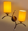 Dual wall mounted gold lamp with Yellow Cotton Shade
