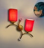 Dual wall mounted gold lamp with Red Cotton Shade