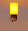 Yellow Cotton Elegant wall lamp with wood & metal base and fabric shade. Perfect