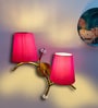 Dual wall mounted gold lamp with Red Cotton Shade
