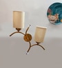 Dual wall mounted gold lamp with off-white Cotton Shade