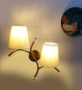 Dual wall mounted gold lamp with off-white Cotton Shade