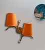 Dual wall mounted gold lamp with Orange Cotton Shade