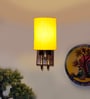 Yellow Cotton Elegant wall lamp with wood & metal base and fabric shade. Perfect