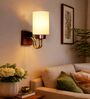 Off-white Cotton Handcrafted wood & metal wall lamp with fabric shade. Perfect