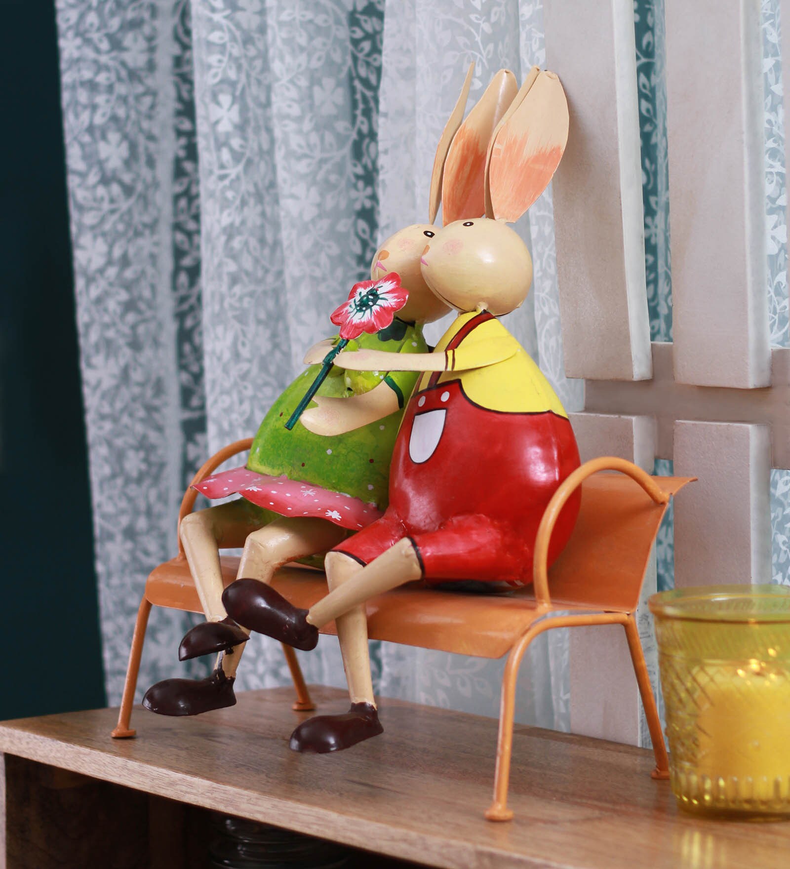 Multicolour Rabits Buy Multicolour Metal Rabits Couple Sitting On Bench Holding Flower ...