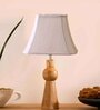 Off-white cotton Vintage  lamp with wood base (12x8x20.75)