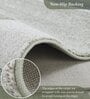 Olive and Blue Abstract Polypropylene 11 ft x 8 ft Machine Made Carpet