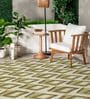 Olive Green Geometric Polyester 5 ft x 7 ft Machine Made Carpet