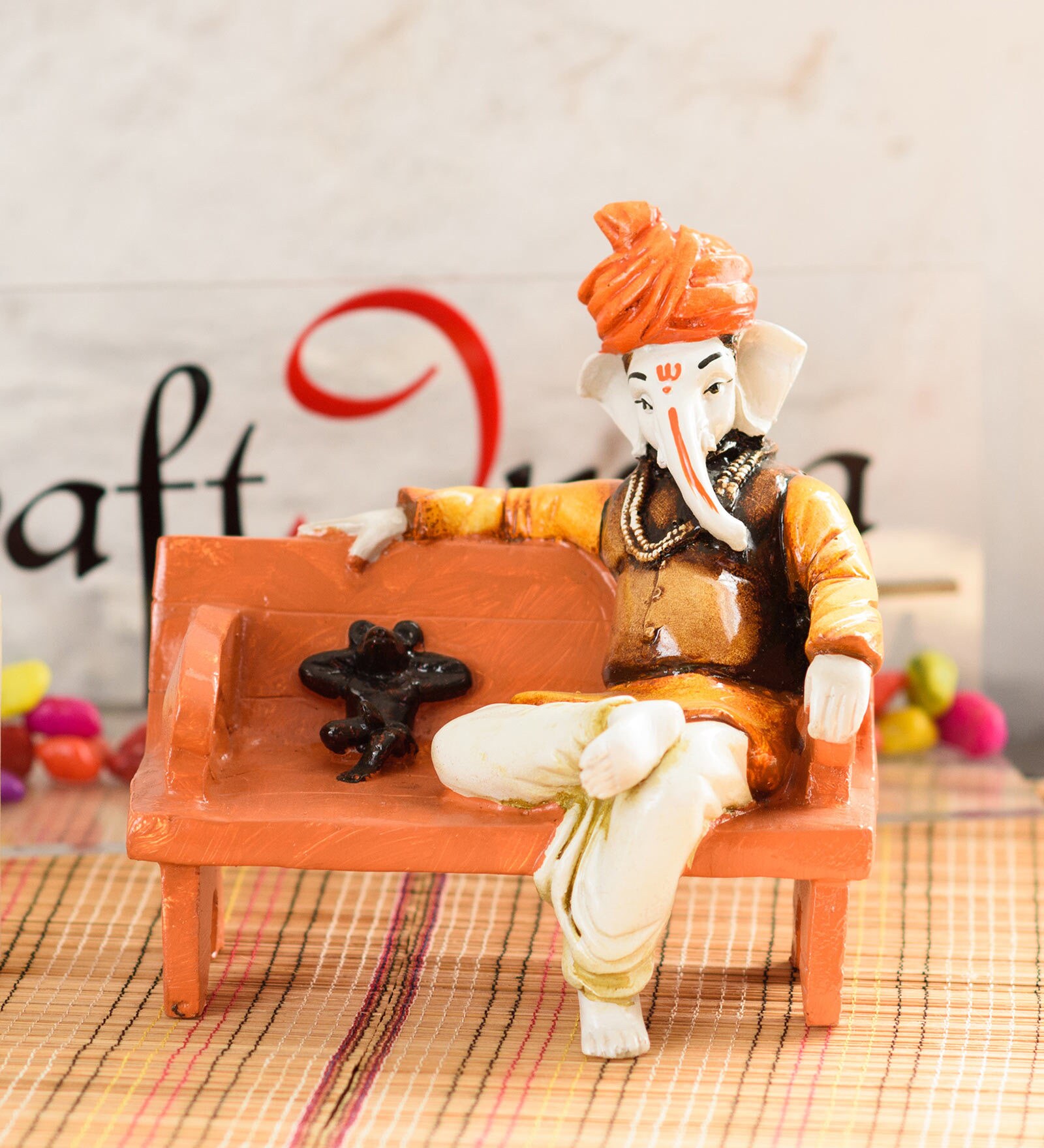 Orange Lord Sitting Ganesha Statue Idol Resting Ganpati Figurine