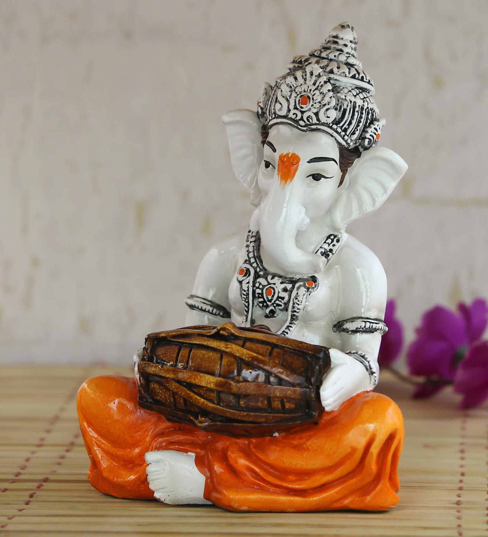 Orange Polyresin Lord Ganesha Playing Dholak Idol