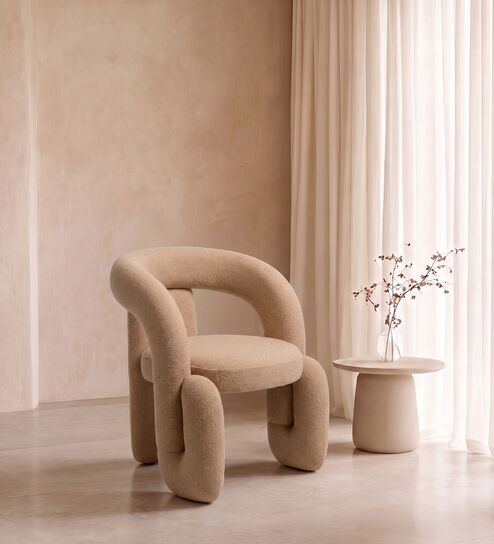 Orevyn Sculpt Lounge Chair In Beige Colour