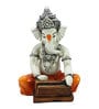 Orange Lord Ganesha Playing Harmonium Decorative Showpiece