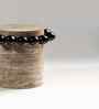 Orbella Travertine End Table In Grey Finish