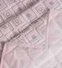 Peach Cotton Polyester Geometric Print 110 GSM Double Bed Quilt
